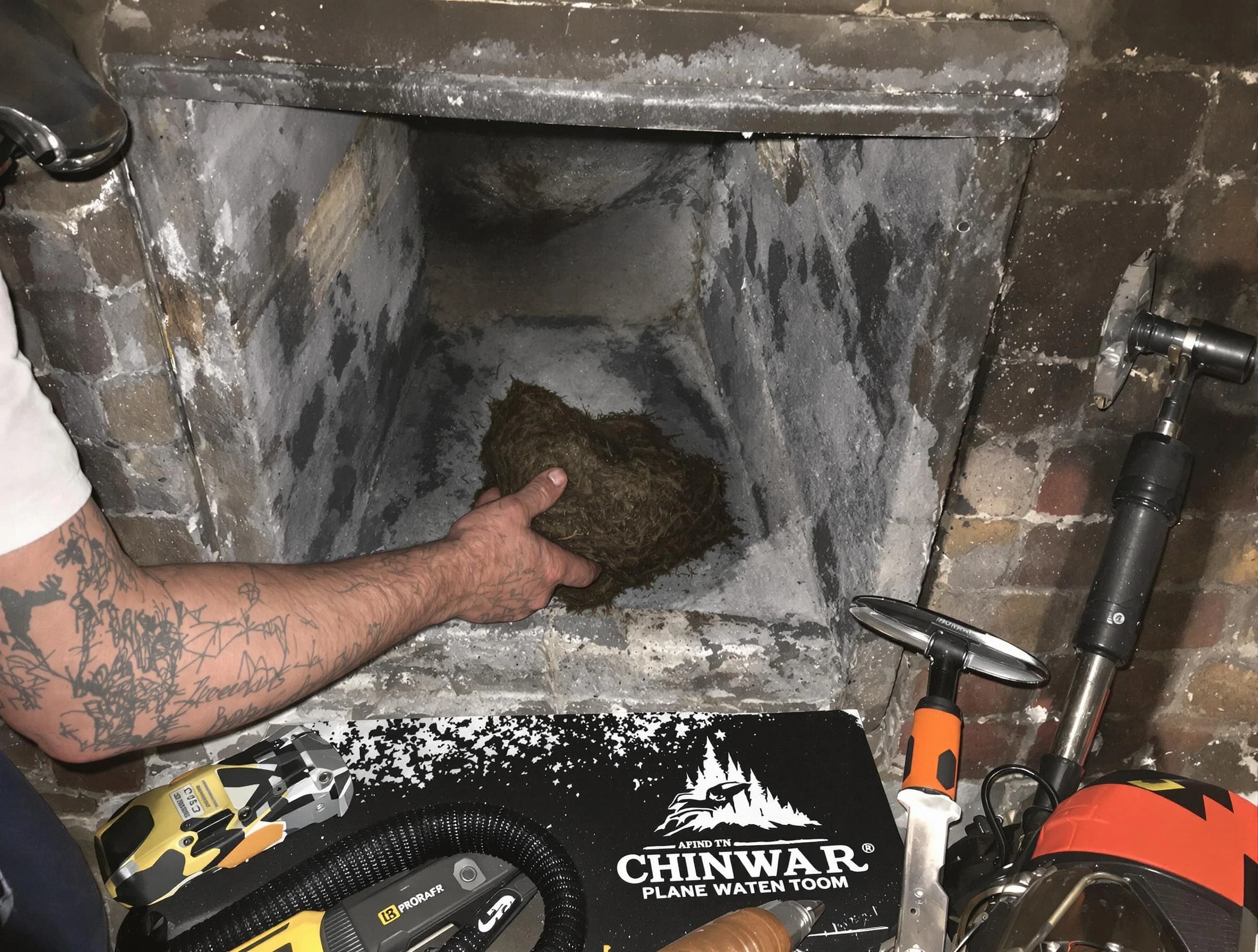 Mahwah Chimney Sweep safely removing debris and screening chimney in Mahwah, NJ